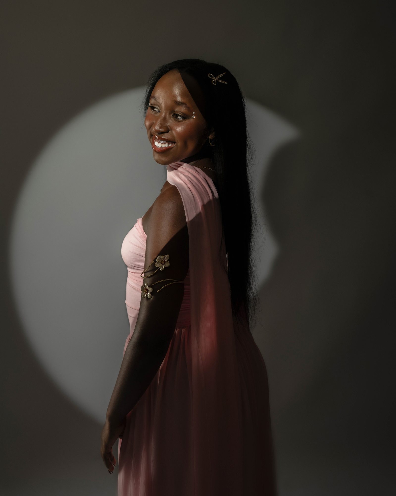 Bee posing in a studio