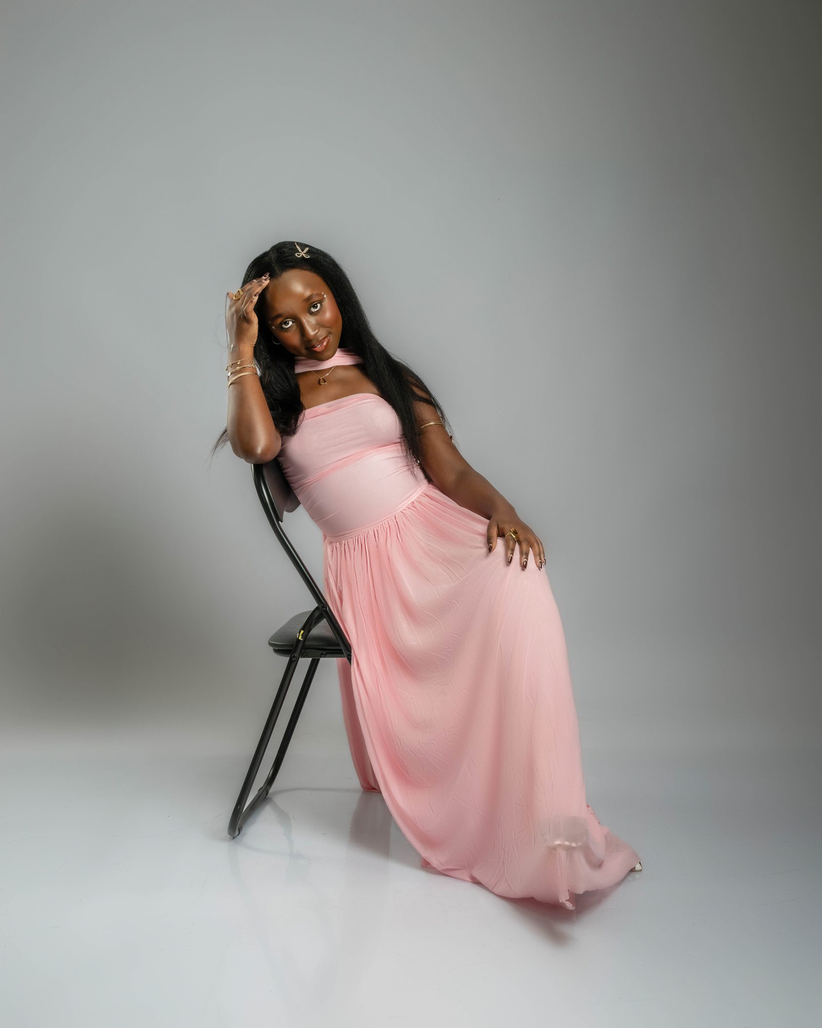 Bee in a pink dress in the studio